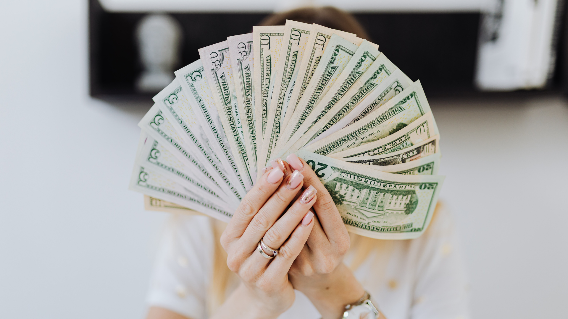 Woman holding money